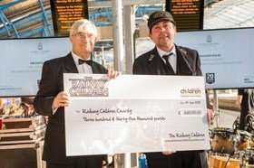 The Railway Children Charity cheque being given