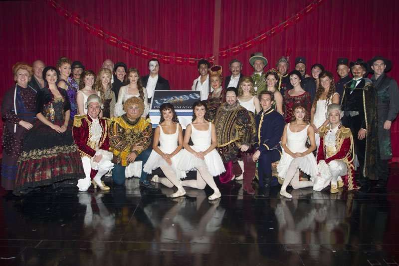Members of the company backstage