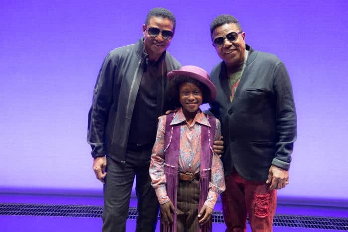l-r Jackie Jackson, Raphael Higgins-Humes (Young Michael Jackson) & Tito Jackson on stage at the Shaftesbury Theatre - Motown the Musical - Photo credit Craig Sugden