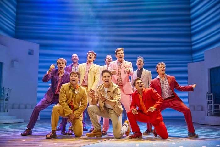 Christopher Jordan-Marshall as Sky (front centre) with the cast of MAMMA MIA! Credit Brinkhoff & Mögenburg