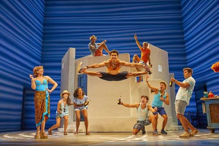 Damien Buhagiar as Pepper (centre) with the cast of MAMMA MIA! Credit Brinkhoff & Mögenburg