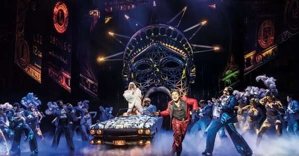 MISS SAIGON. Red Concepcion 'The Engineer' and company. Photo by Johan Persson