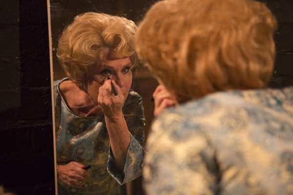 Imelda Staunton who plays Sally Durrant reapplying her make-up backstage at the National Theatre (c) Ellie Kurttz