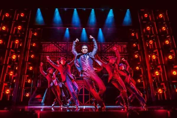 Joe Aaron Reid and company in Dreamgirls at the Savoy Theatre. Credit-Dewynters.
