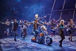Andrew Polec as Strat and cast in BAT OUT OF HELL THE MUSICAL. Photo Credit Specular