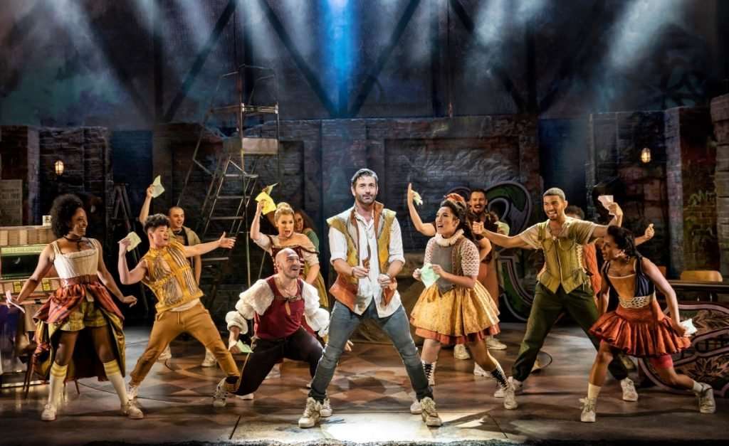 & Juliet Oliver Tompsett (William Shakespeare) and ensemble