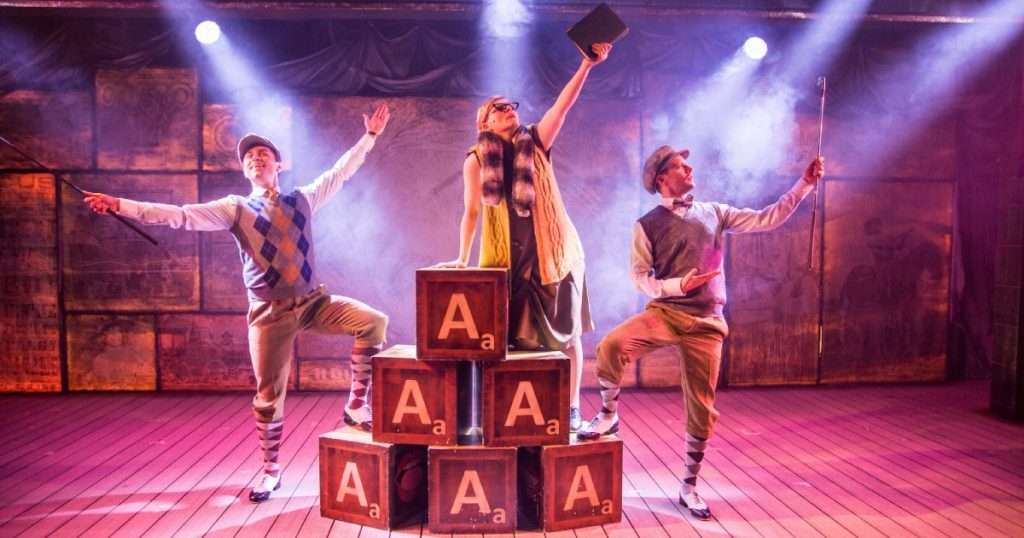Singing in the Rain: Philip Bertioli as Don Lockwood, Sorelle Marsh as Dora Bailey, Brendan Cull as Cosmo Brow- Photo by Andreas Lambis.