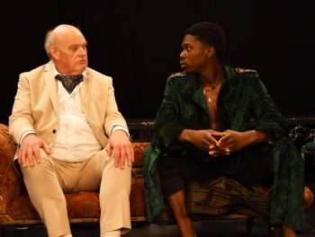 Richard Rycroft as Lord Peter de Meur and Ola Teniola as Kanaka in Don't Take The Pith! Photo credit: Wala Arts.